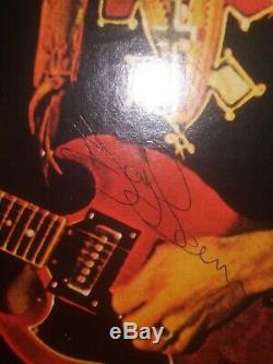OZZY OSBOURNE & TONY IOMMI AUTOGRAPHS with concert ticket stub July 27, 1975