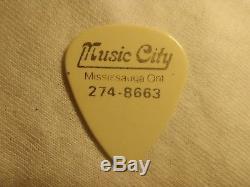 Rick Emmett concert used guitar pick with signed ticket stub 1984 Cincinnati